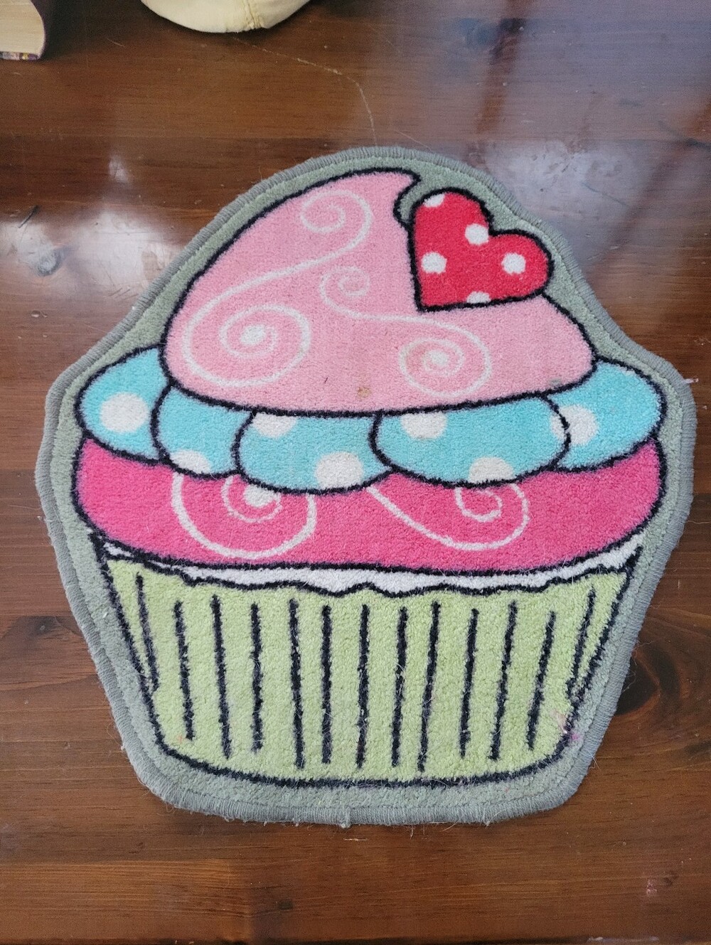 Small Cupcake Rug, Used. Comes as shown. See photos for size and wear.